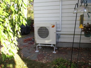 Outdoor heat pump for ductless mini-split in Bedford, MA cape 