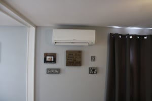 Indoor air handler for Mitsubishi ductless AC system.