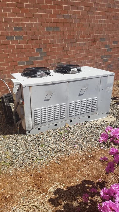 New outdoor condenser unit installed for walk-in refrigeration system in Westwood, MA. 