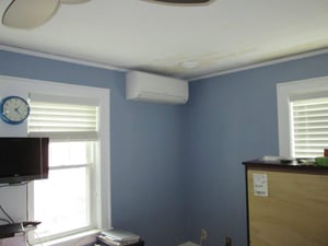 Ductless mini-split system replaces window air conditioners in Arlington, MA Dutch colonial 