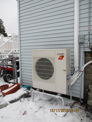 Outdoor condenser installed for Salem home ductless AC system.