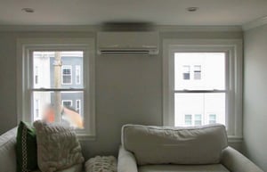 Indoor installation of wall cassette for ductless system.