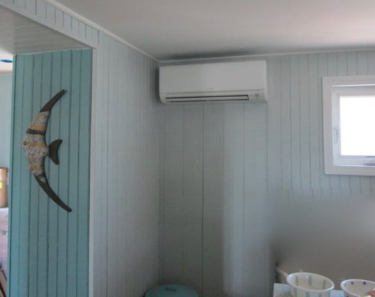 Newburyport home gets perfect year round comfort with ductless air source heat pumps Beach home gets ductless heating and cooling units installed for year-round comfort.