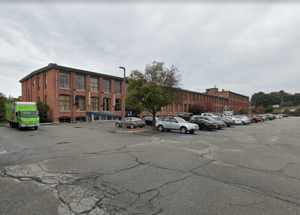 N.E.T.R., Inc. installs a ductless system with four indoor AC units and an outdoor heat pump.