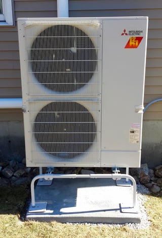 Mitsubishi dustless heat in Tewksbury, MA. Outdoor installation of a Mitsubishi ductless unit in Tewksbury, MA.