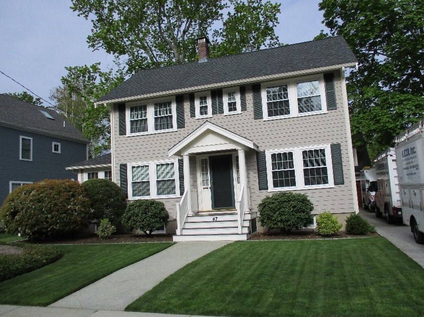 Needham Colonial home gets rid of window ACs for ductless air conditioning